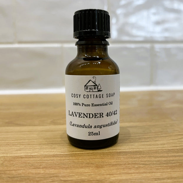 lavender essential oil on wooden worktop