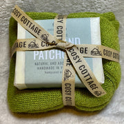 110g Cosy Cottage hemp and patchouli soap and green woollen socks tied in a bundle with Cosy Cottage ribbon