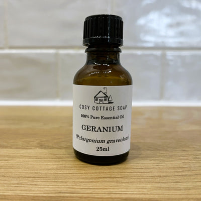 geranium essential oil on wooden worktop