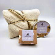 cosy cottage baby soap and barrier cream in a baby towel