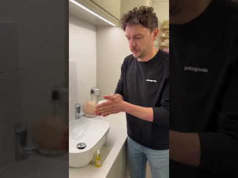 Video of a man using Cosy Cottage facial products