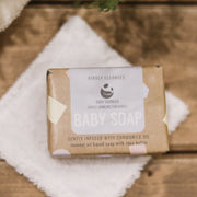 Cosy Cottage Soap Cosy Cuddles Baby Soap on a wooden bench