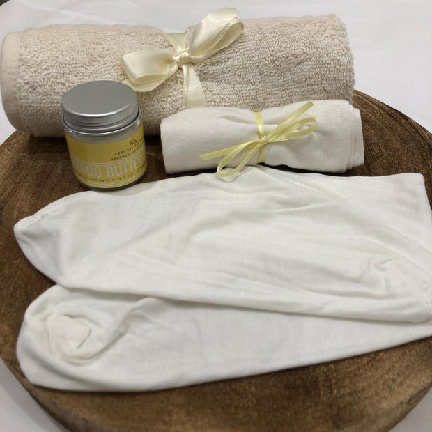 bamboo moisturising socks and mango butter foot balm with small cotton towel