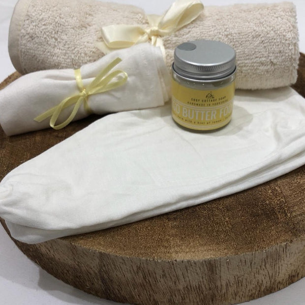 bamboo moisturising socks and mango butter foot balm and small cotton towelr 
