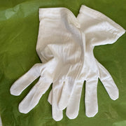 pair of unbleached cotton gloves