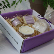 Cosy Cottage gift box containing lavender soap, hand & body cream, bath bomb and ramekin candle