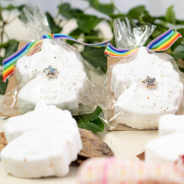 children's unicorn shaped bath bombs wrapped in compostable cellulose packaging 