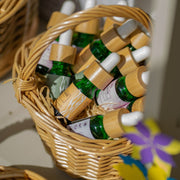 A basket full of Cosy Cottage essential oils 