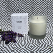  Cosy Spa lavender candles in frosted glass jar with Cosy Spa branded candle box and fresh lavender flowers