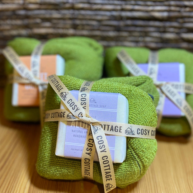 55g Cosy Cottage soap with Yorkshire made green woollen socks tied into a bundle