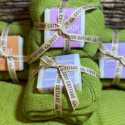 55g Cosy Cottage soaps with Yorkshire made green woollen socks tied into  bundles