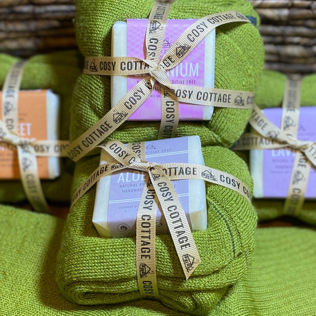 55g Cosy Cottage soaps with Yorkshire made green woollen socks tied into  bundles