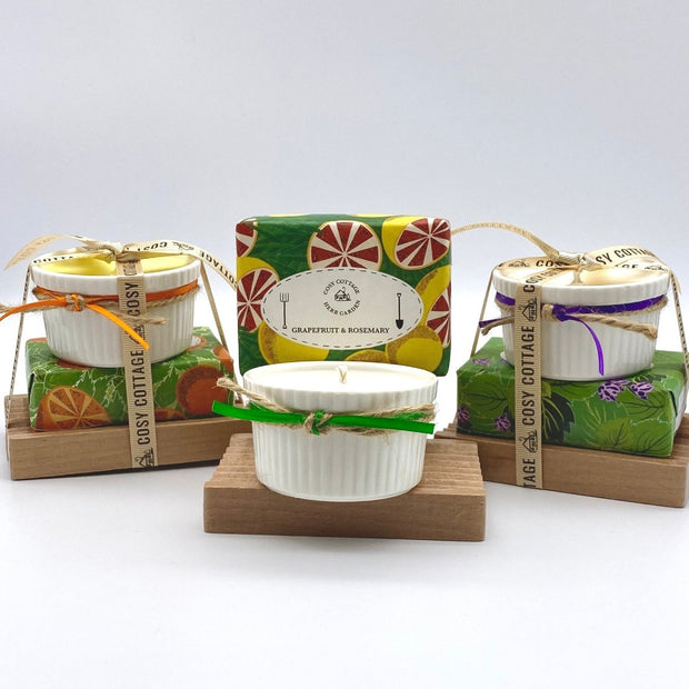 hand-decorated ramekin candles, herb garden soaps and wooden soap dish bundles