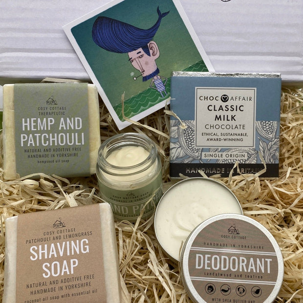gift box containing hemp & patchouli soap, shaving soap, sandalwood deodorant, hemp & patchouli  hand balm and 30g bar milk chocolate