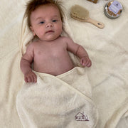 baby wearing Cosy Cottage hooded towel