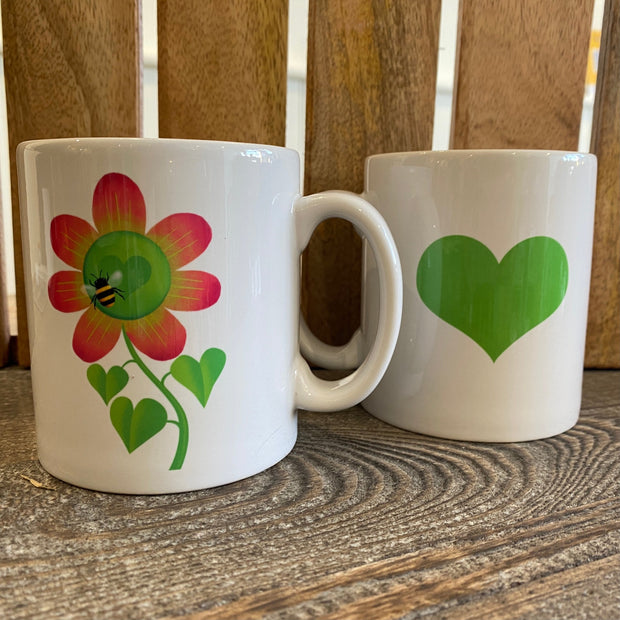Two Cosy Cottage Cooperillo designed china mugs, featuring  Brenda Bee sitting on a red flower. Colourful designs on white background