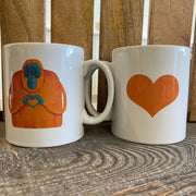 Two Cosy Cottage Cooperillo designed china mugs, featuring  Olive Orangutan. Colourful designs on white background