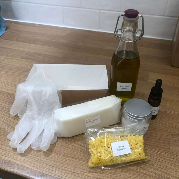 home soap making kit unboxed on a wooden work top