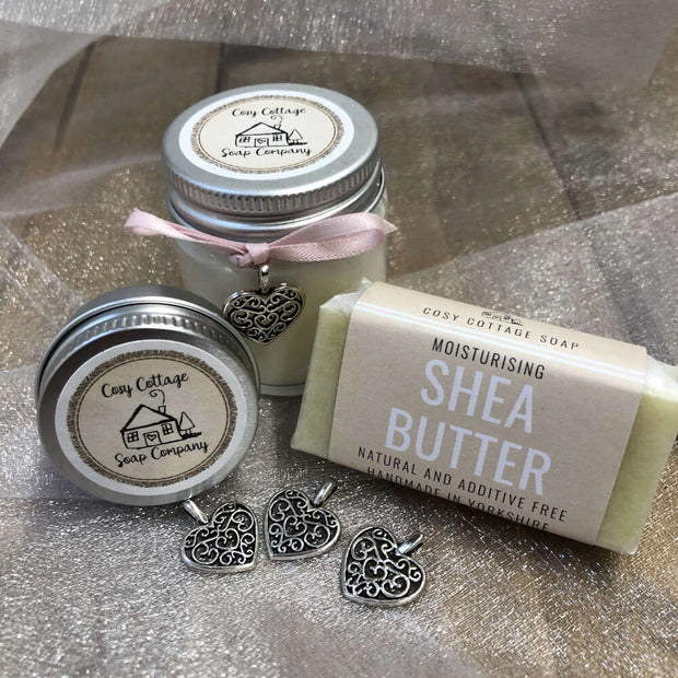 moisturising shaving travel soap, soy wax candle and lip balm with love heart pendants